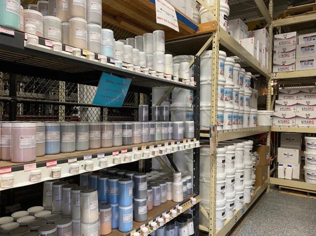 Epoxy Warehouse USA store aisle with coating supplies on shelves