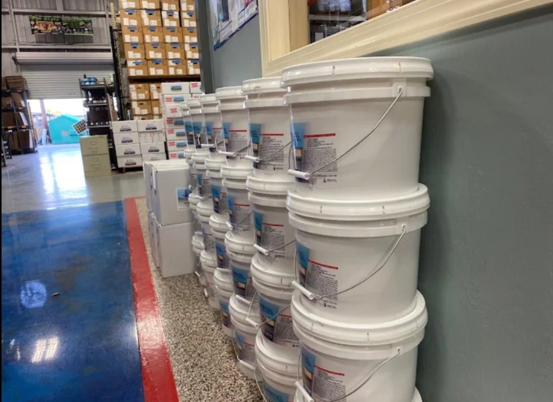 Epoxy Warehouse USA warehouse buckets and flake floor inventory