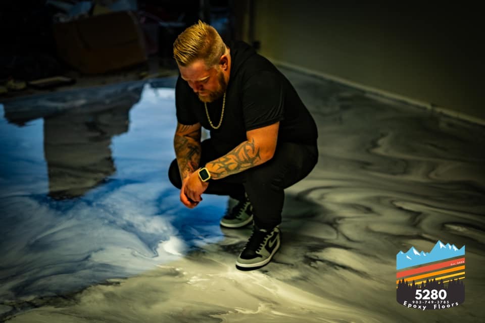 Faith — grey and black metallic epoxy floor with a person in the shot — Brian Harper, 5280 Epoxy Floors, Dallas TX